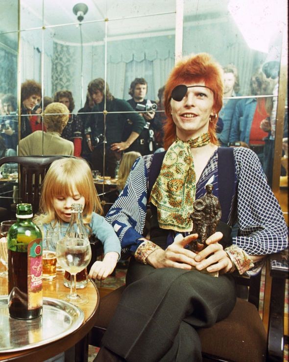 Off-duty in 1974 with his son Zowie (now Duncan Jones.)